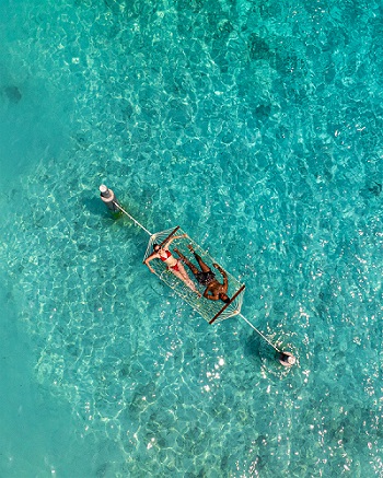 Um mergulho refrescante e um contato com a biodiversidade marinha da Ilha Maldivas - Foto: Divulgação